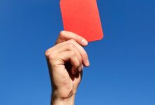 Dire Situations : Surviving A Red Card A Red Card Being Held Up