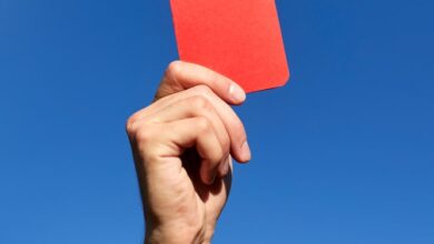 A Red Card Being Held Up