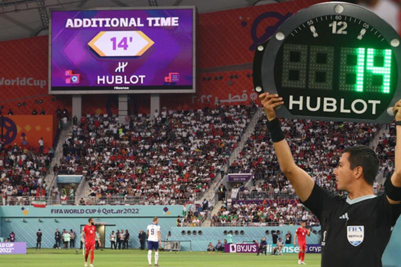 Fourth Official Indicating 14 Minutes of Additional Time