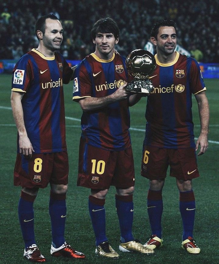 (L to R) Andres Iniesta, Lionel Messi and Xavi Hernandez